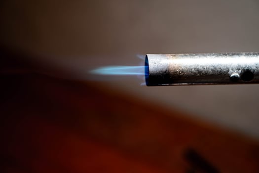 Gas torch with blue flame photo
