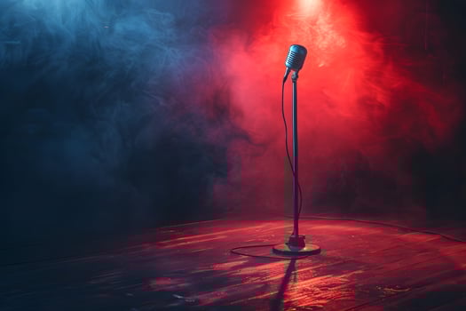 Close up of microphone on wooden floor emitting smoke photo