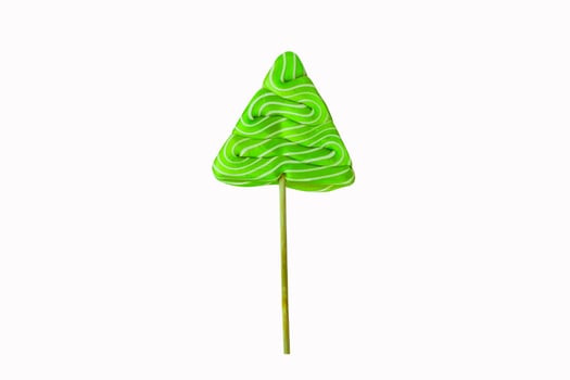 Traditional Christmas tree candy. Christmas treats. Green lollipop in the form of spruce isolated on white background photo