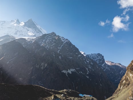 clouds over the mountains, mountains in the fog, during annapurna, annapurna base camp nepal photo