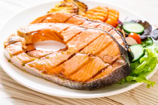 grilled salmon steak fillet with vegetable photo