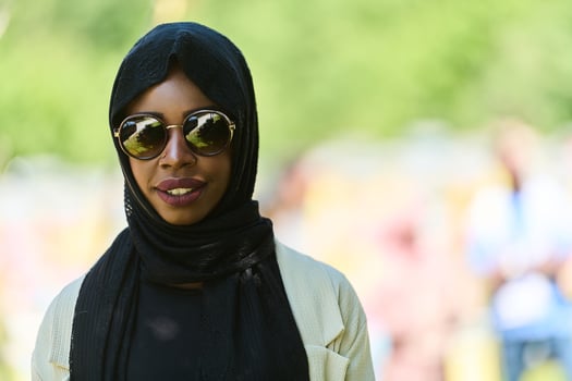 A Journey Through Nature's Beehives with an African American Muslim Woman photo