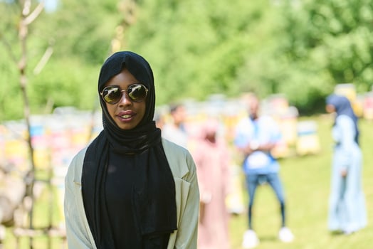 A Journey Through Nature's Beehives with an African American Muslim Woman photo