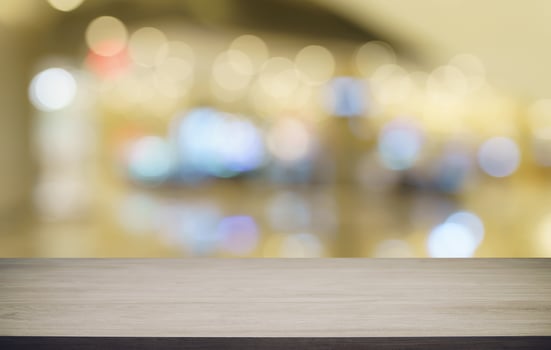 Empty wood table top and blur of out door garden background Empty wooden table space for text marketing promotion. blank wood table copy space for background photo