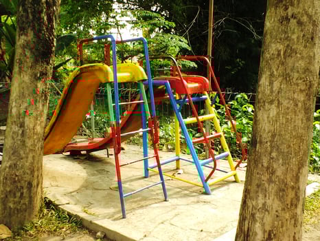 Colorful children's play equipment at the outdoor park. quiet atmosphere no children playing around it photo