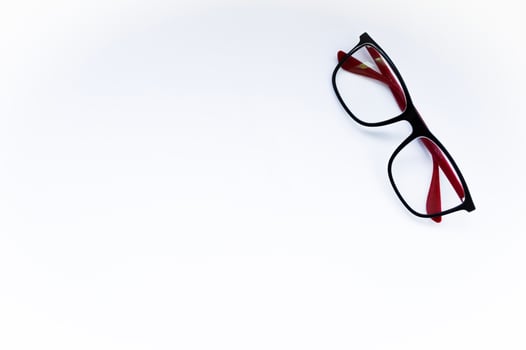 Glasses on white background. Education concept photo