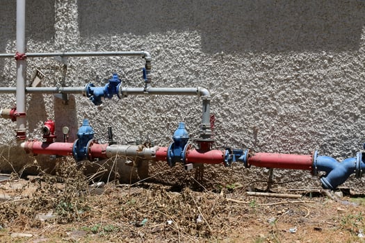 Metal water pipes and taps photo