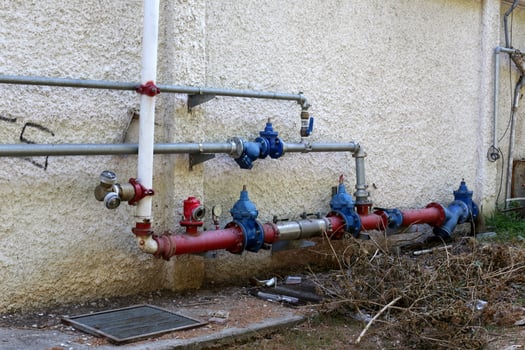 Metal water pipes and taps photo