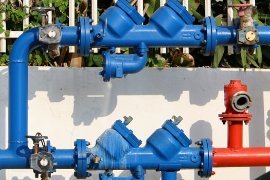 Metal water pipes and taps photo
