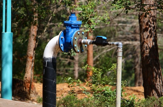 Metal water pipes and taps photo