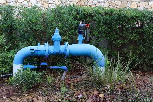 Metal water pipes and taps photo