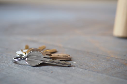 house keys on the ring on table in a room. To forget keys at home concept , photo