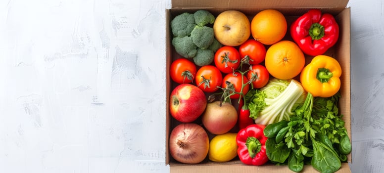 Assorted fresh vegetables in a cardboard box on a white textured background. Concept of healthy eating, organic food delivery, nutrition, fresh produce. Copy space photo