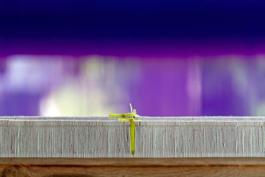 Threads of Tradition A Loom's Intricate Detail photo