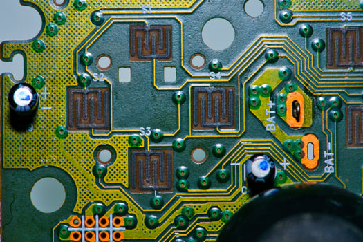 a close up of a computer motherboard photo