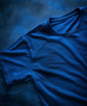 Blue T-Shirt On A Blue Background photo
