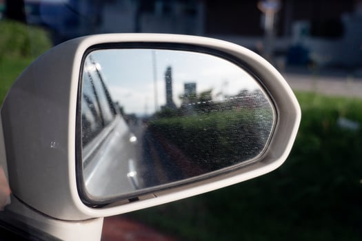 Side of mirror wing of car white color. photo