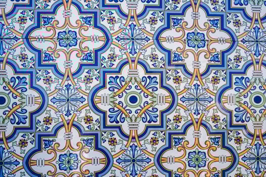 ceramic tile with a traditional Uzbek ornament with a oriental pattern. Wall of white mosque Minor in Uzbekistan photo