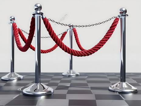 Stanchions with red velvet ropes, cut out in high resolution photo
