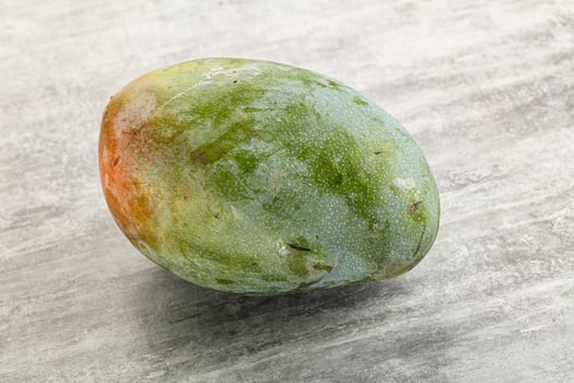 Ripe sweet green tropic mango photo