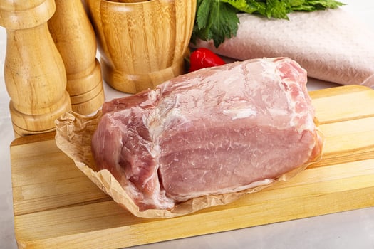 Raw uncooked pork meat loin photo