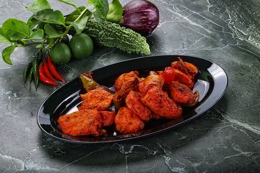 Indian cuisine - chicken tikka barbecue photo