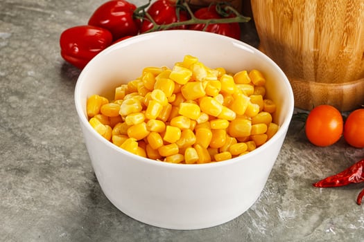 Sweet canned ripe corn grain photo