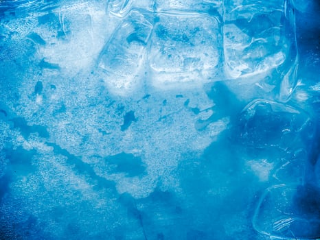 icecubes background,icecubes texture,icecubes wallpaper,ice helps to feel refreshed and cool water from the icecubes helps the water refresh your life and feel good.ice drinks for refreshment business photo