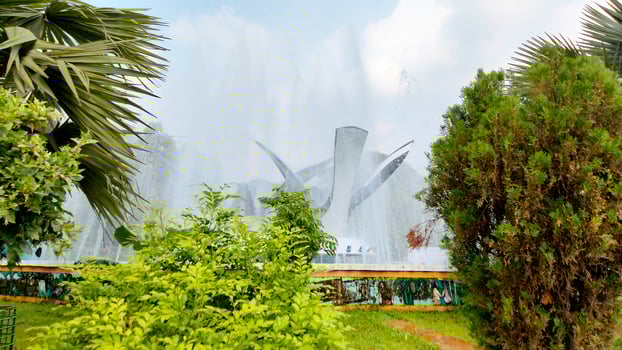Splashing fountain in public park in City photo