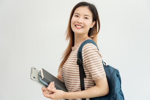Portrait beautiful Asian woman student. Smile girl happy study. read book in college campus. young female on international Asia University. Education, study, school, learning, exam, continue education photo