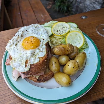 French Bistro Delight Croque Madame and Fresh Vegetable Plate photo