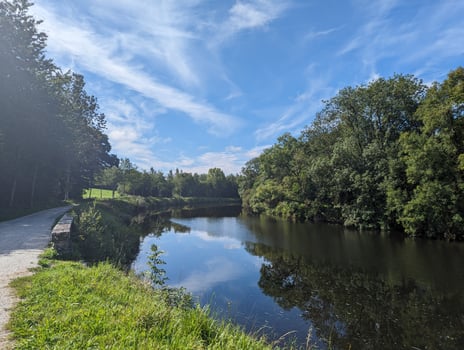 Reflections Chateaulin Village Nestled by Riverbanks and Forest photo