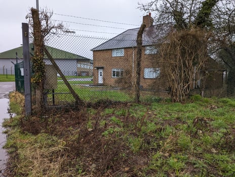 Rural house in wet weather conditions photo