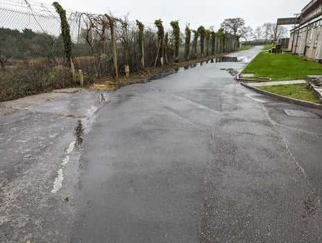 Empty wet road by buildings in South Wales photo