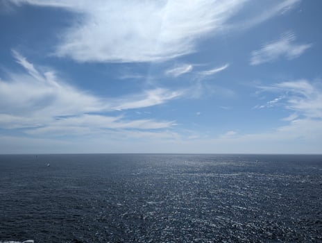 Breton Coastal View Blue Sky, Clouds, and Horizon over Water photo