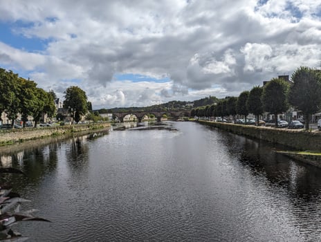 Charming Village with Reflections on Alune Waterway in Brittany photo