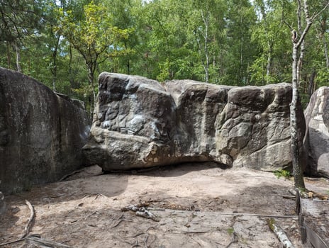 Autumn Hiking in Fontainebleau Forest, France. Sunny Day Bouldering Amid Sandstone Rocks photo