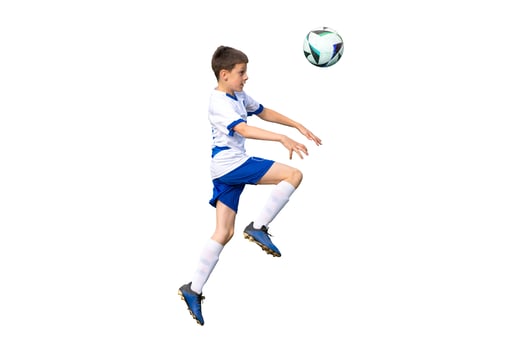 Isolated young soccer player leaps into the air, using his head to direct the ball in a dynamic and intense soccer match scene photo