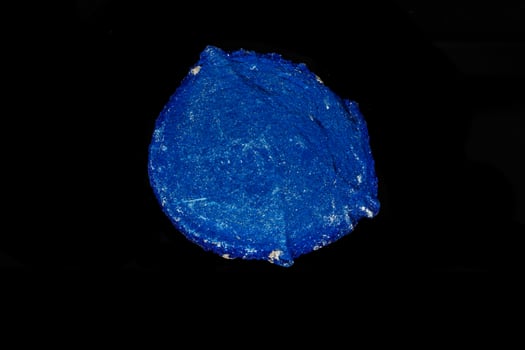 Macro mineral stone Azurite in siltstone against black background photo