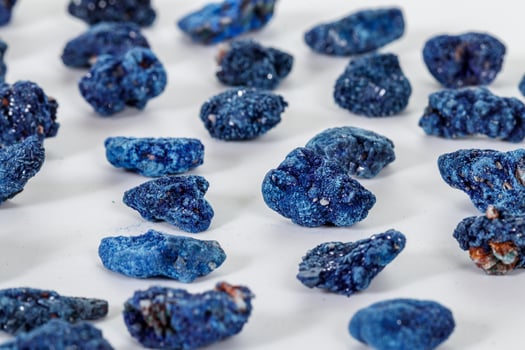 Macro mineral stone Malachite and Azurite against white background photo