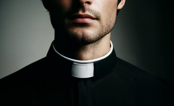 Young Male Priest Wearing Clerical Collar photo