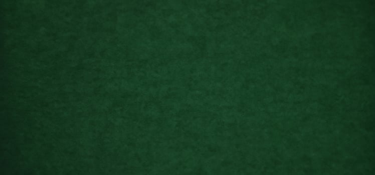 High-Quality Dark Green Paper Texture Background Ideal for Scrapbooking and Seasonal Concepts photo