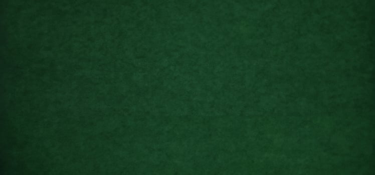 High-Quality Dark Green Paper Texture Background Ideal for Scrapbooking and Seasonal Concepts photo