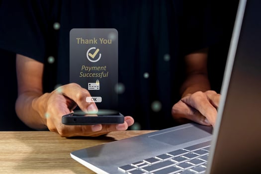 Man making payment for online shopping using a smartphone. Online payment concept. photo