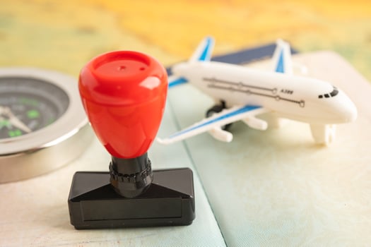 Approved Stamp visa and passport document to immigration at airport in country. photo