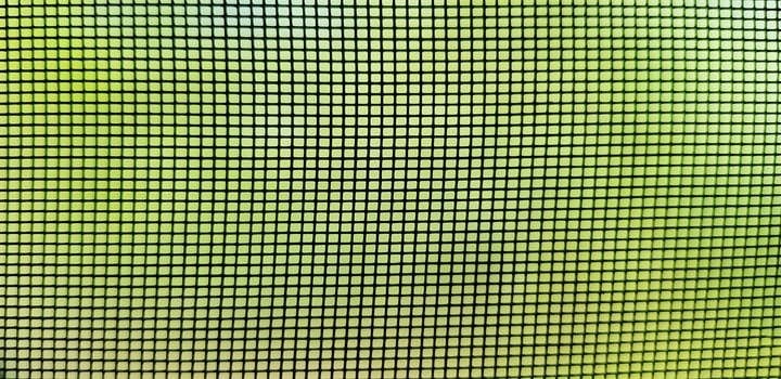 Black net with green blurred background. Pattern seamless of line wallpaper and square shape. photo
