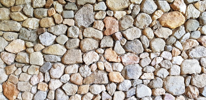 Colorful stone or rock wall for background. Abstract or Art wallpaper, Surface, Floor, Design and Exterior decoration photo