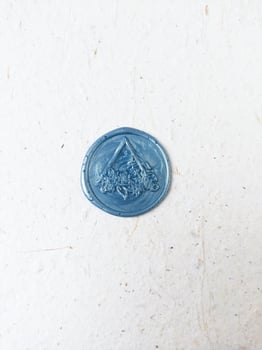 colorful wax stamp on white background. isolated. round photo