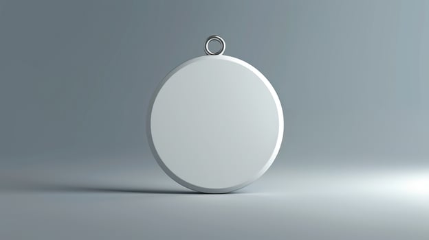 Minimalist blank round ornament with a loop on top, placed on a smooth gradient background. Ideal for mockups and design templates. photo