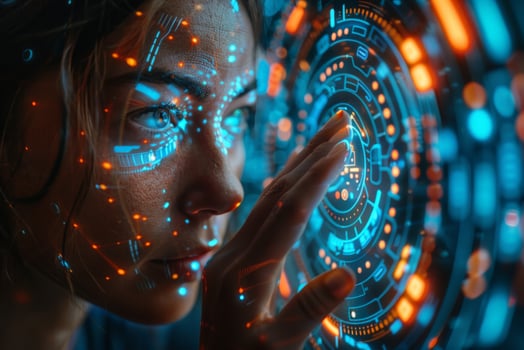 A woman interacts with a futuristic screen by touching it photo